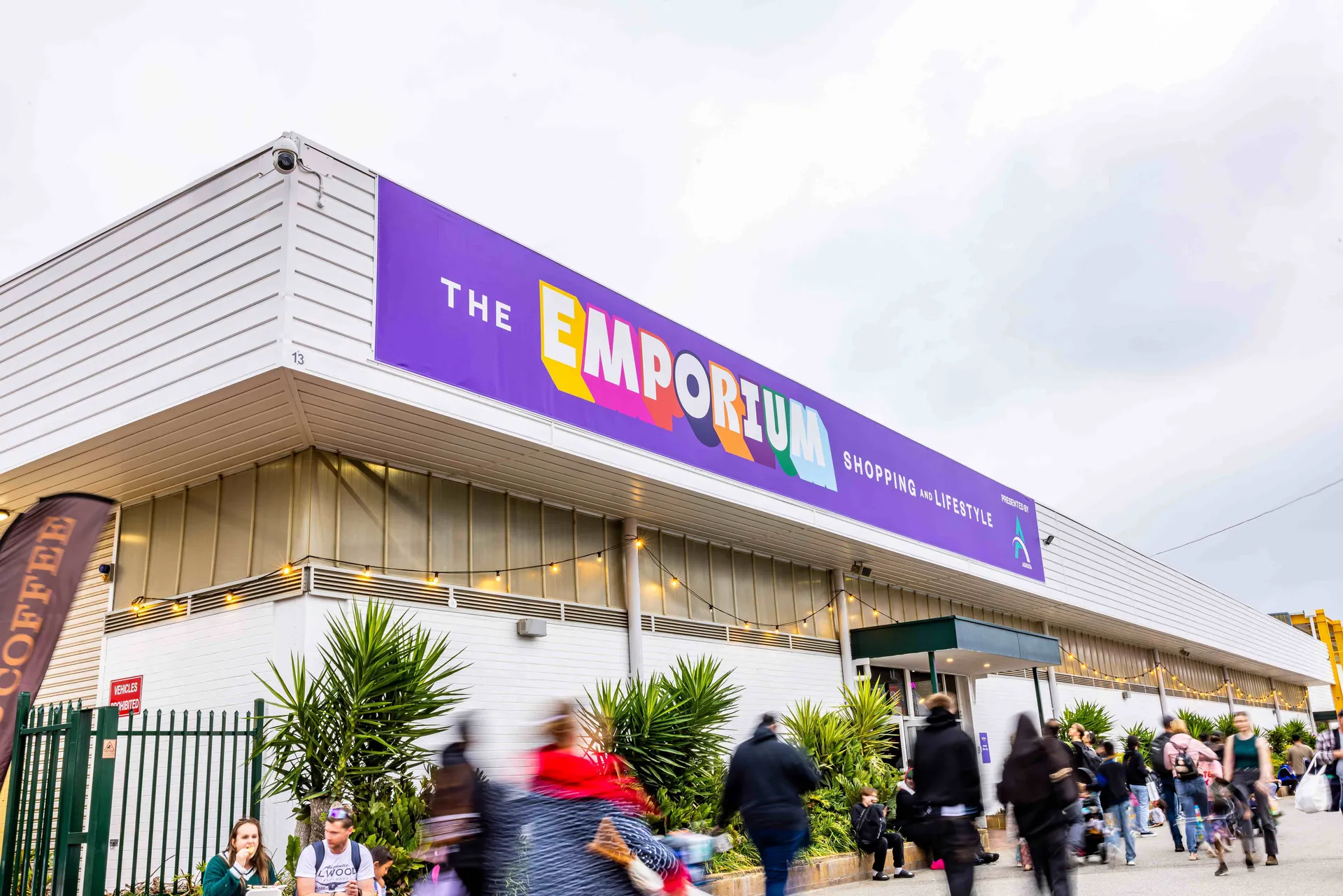 The Emporium shopping and lifestyle precinct at the Perth Royal Show, with visitors arriving and passing by the entrance.