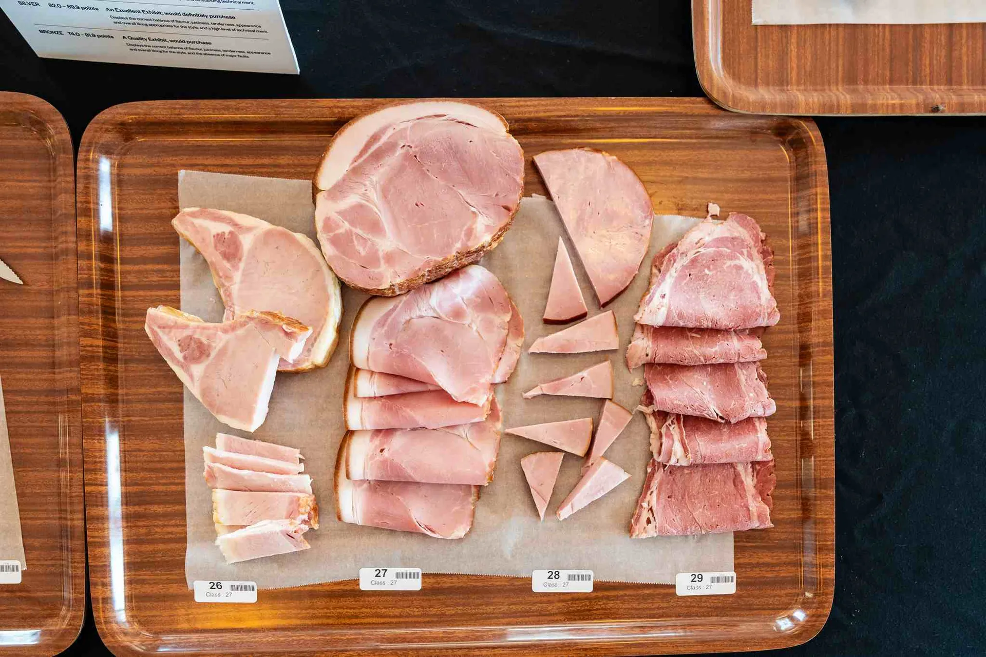 Sliced ham samples arranged for judging at the Perth Royal Food Awards.