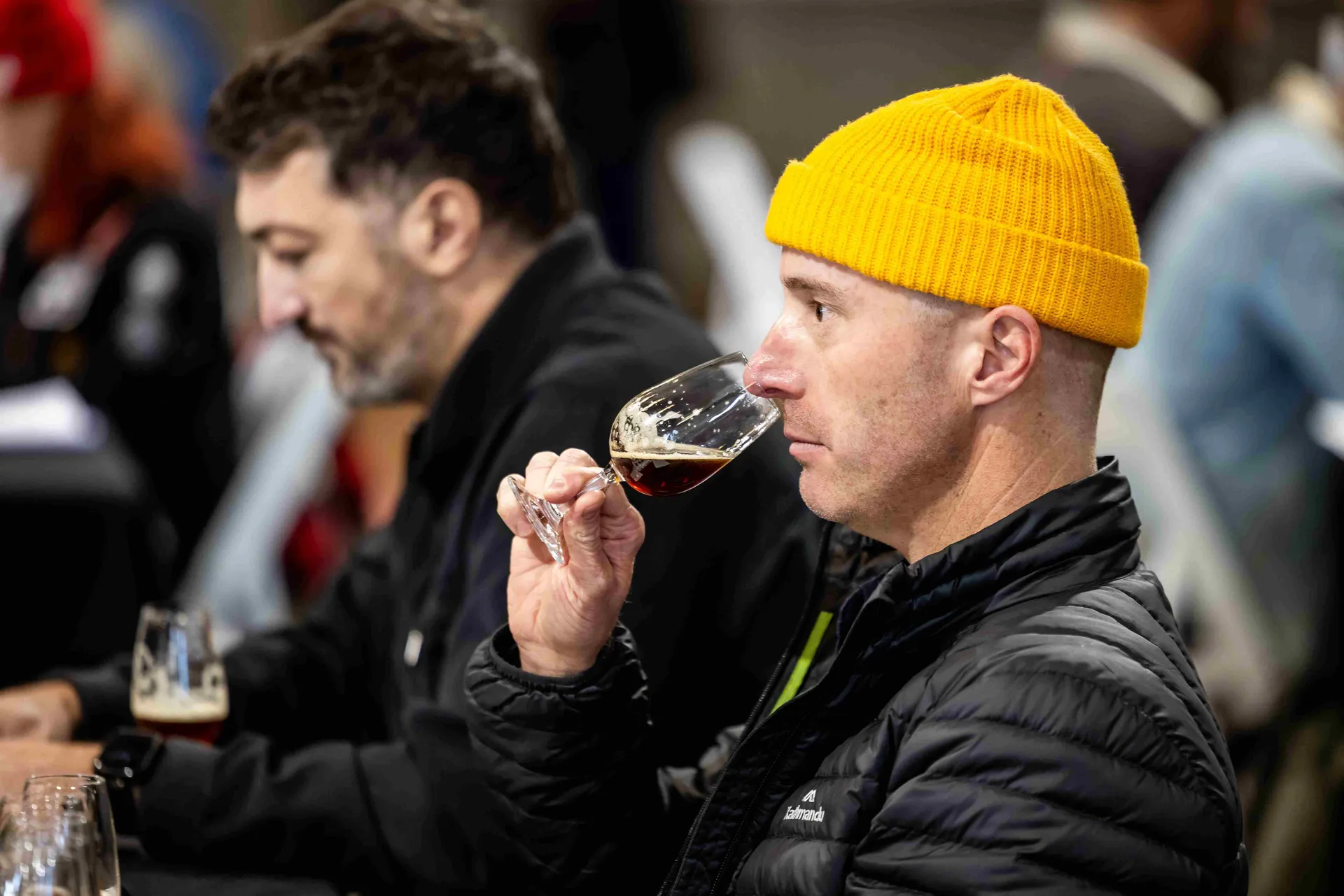Judge tasting beer at the Perth Royal Food Awards.