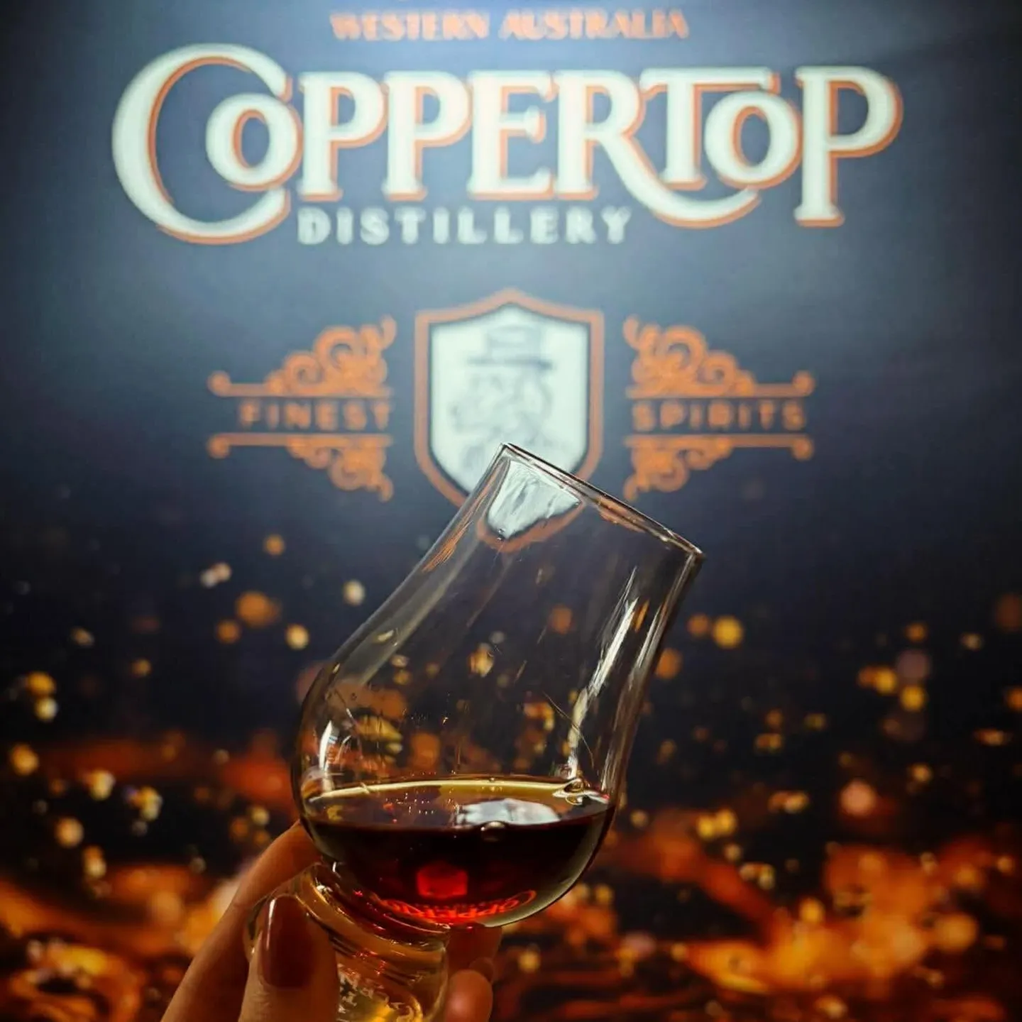 Copper top glass of gin
