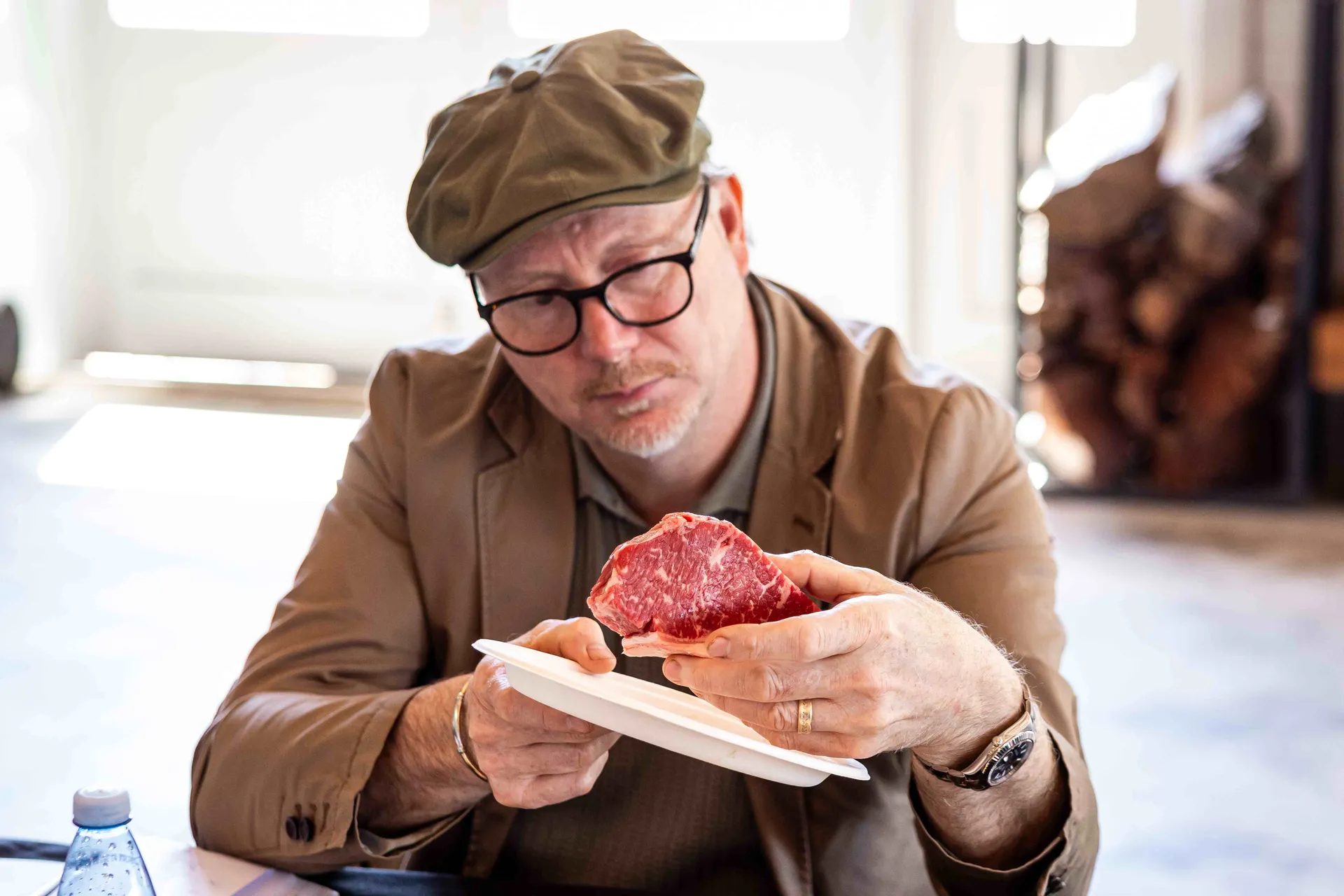Judge inspecting a steak at the Perth Royal Food Awards.