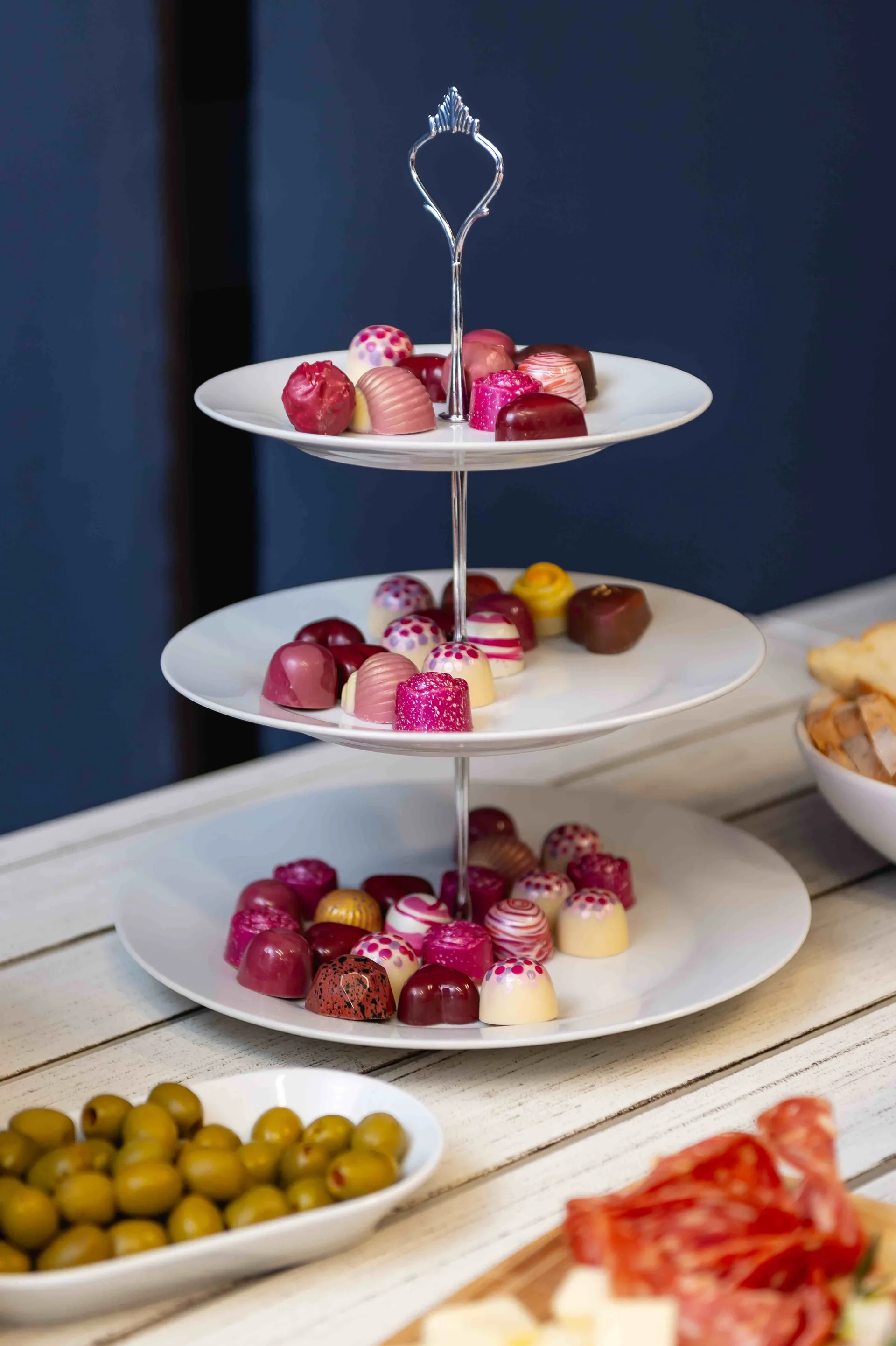 Assorted chocolates displayed on a tiered stand at the Perth Royal Food Awards.