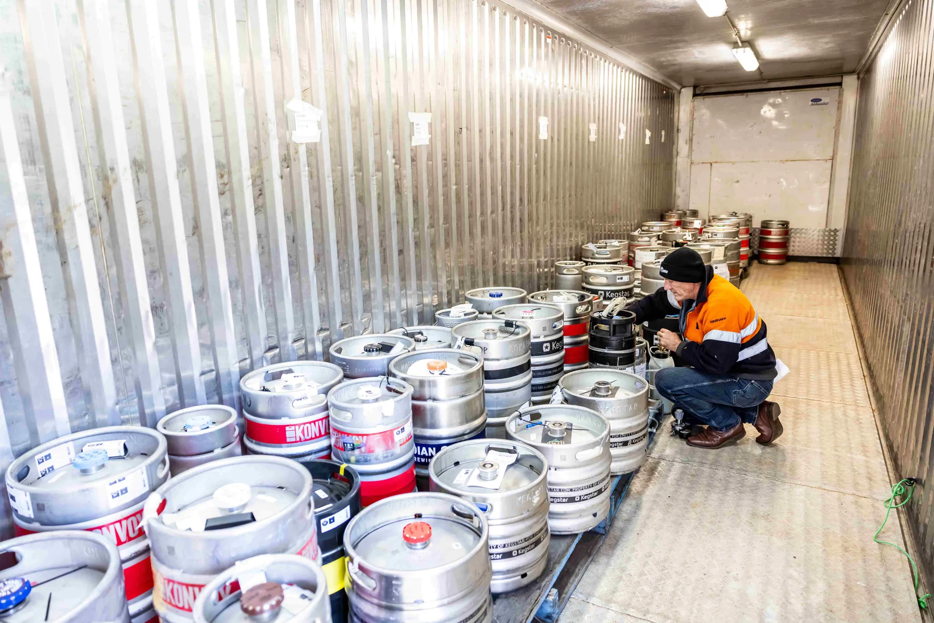 Staff organising beer kegs at the Perth Royal Food Awards.