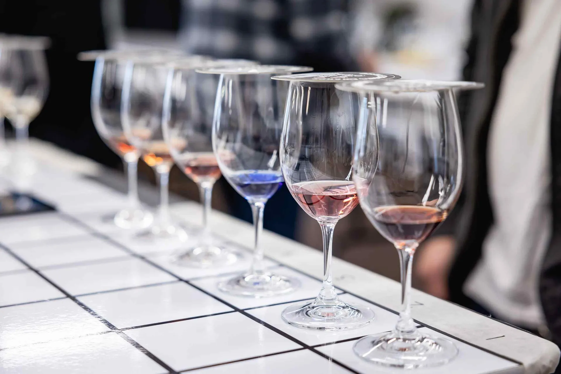 Judges assessing a drink sample at the Perth Royal Food Awards.