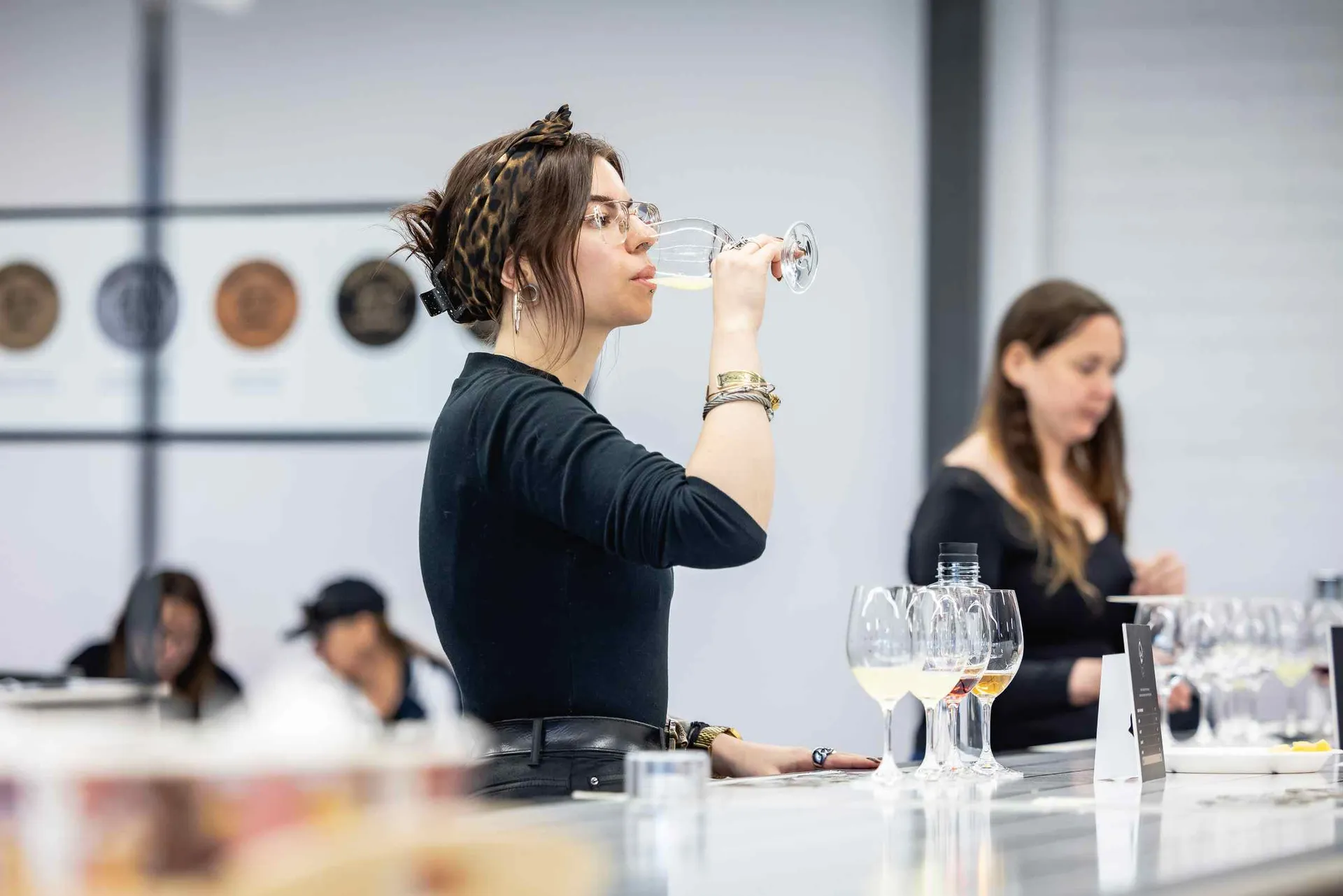 Judges assessing a drink sample at the Perth Royal Food Awards.