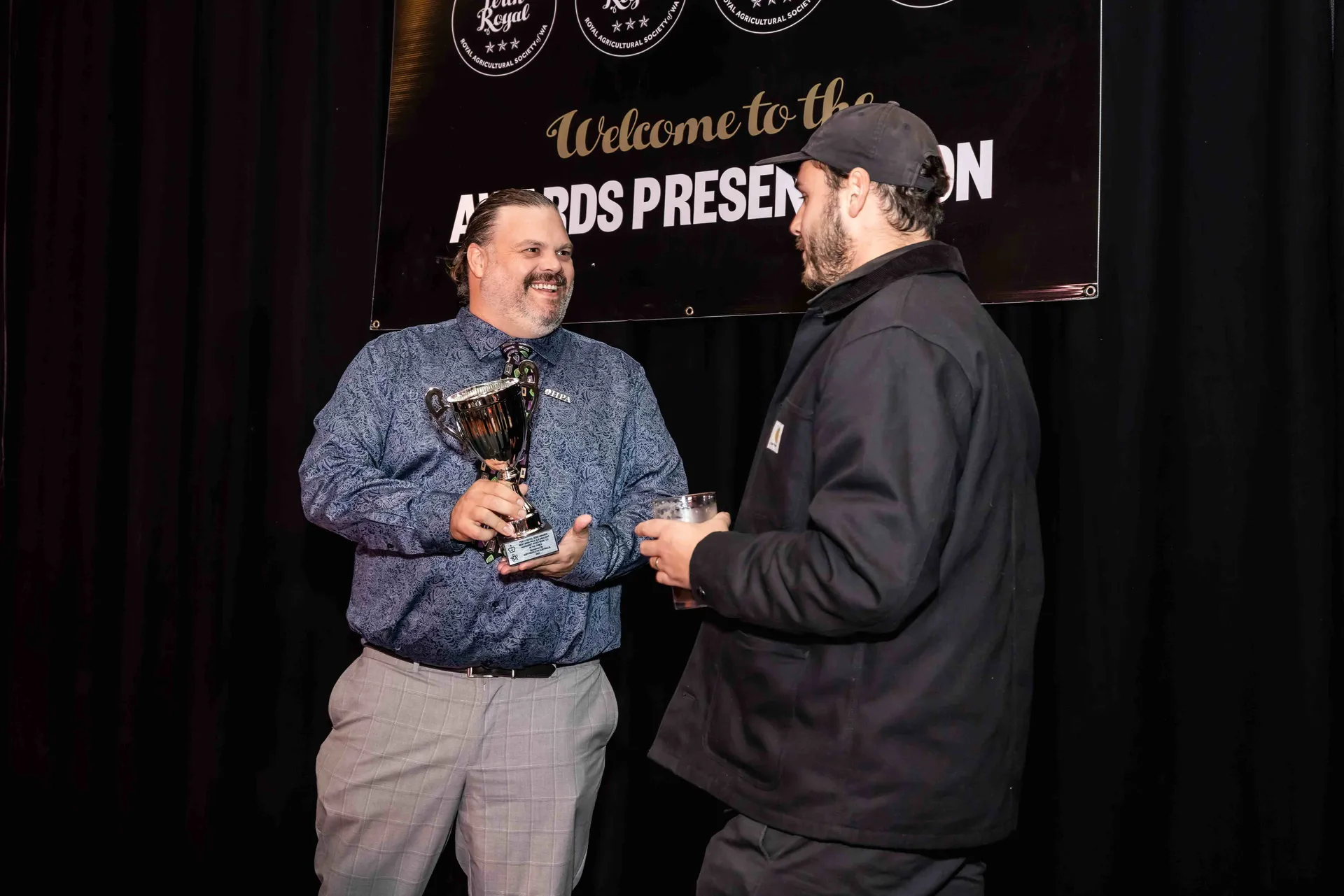 Winner receiving a trophy at the Perth Royal Food Awards presentation.