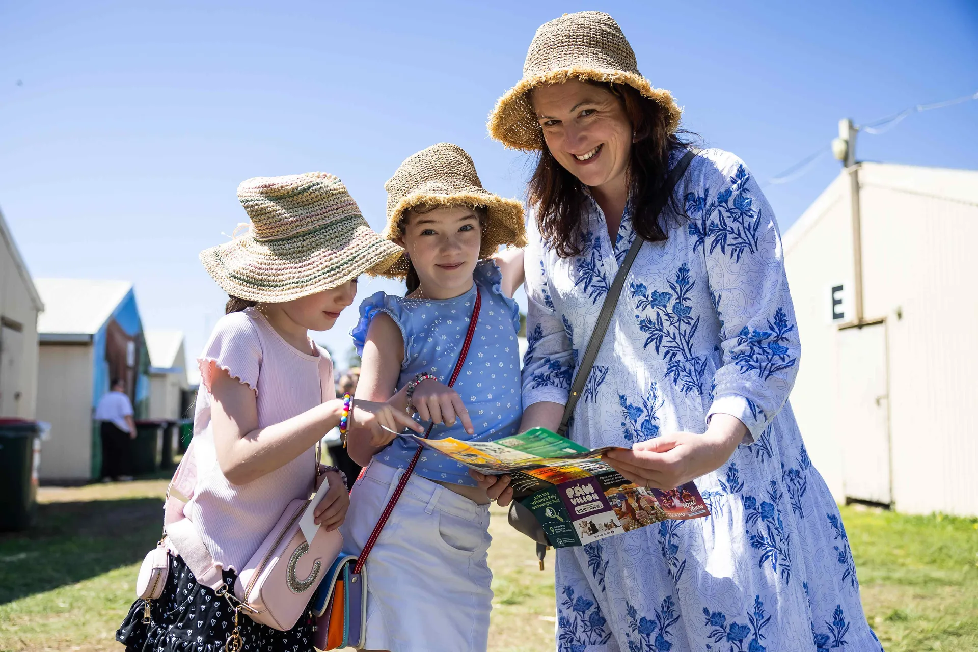 Family looks at Perth Royal Show map