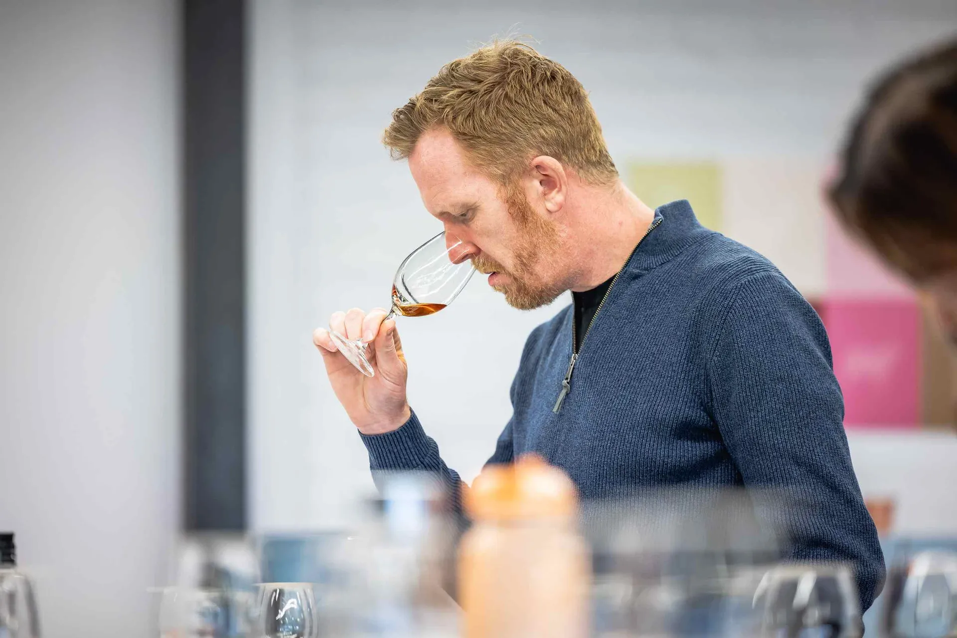 Judges assessing a drink sample at the Perth Royal Food Awards.