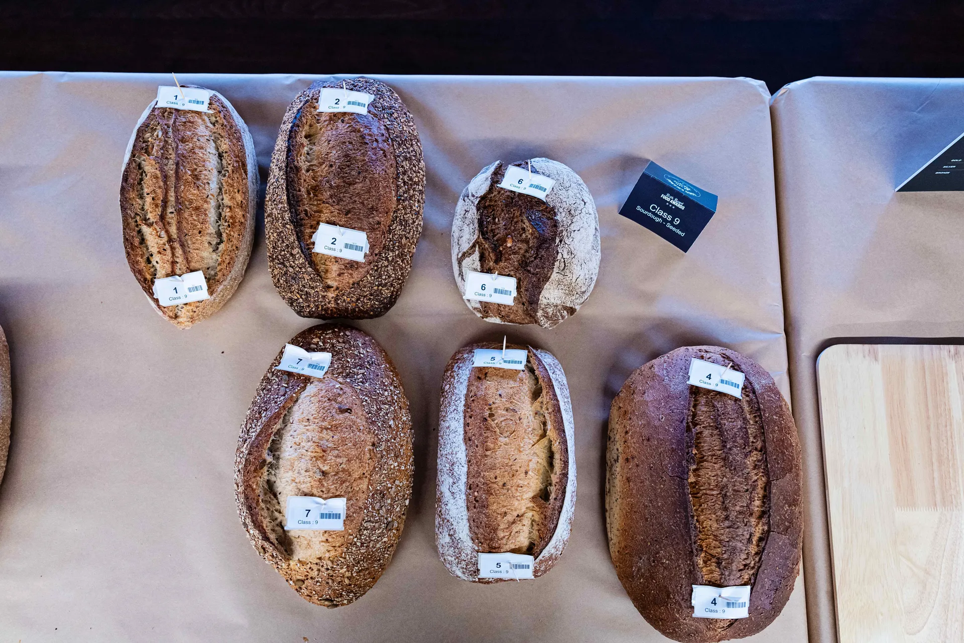 A selection of artisan loaves presented for judging at the Perth Royal Food Awards, highlighting craftsmanship in breadmaking.