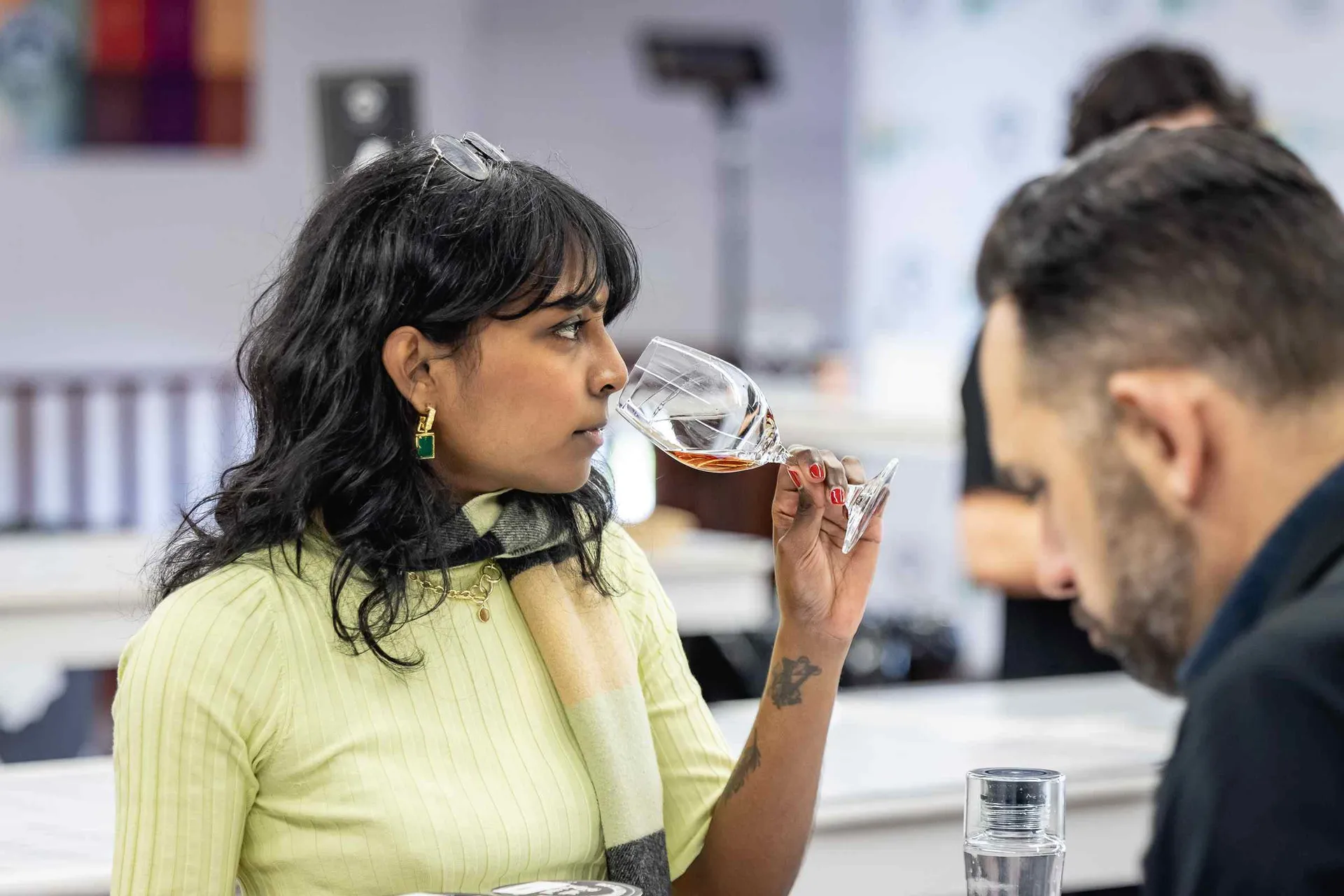 Judges assessing a drink sample at the Perth Royal Food Awards.