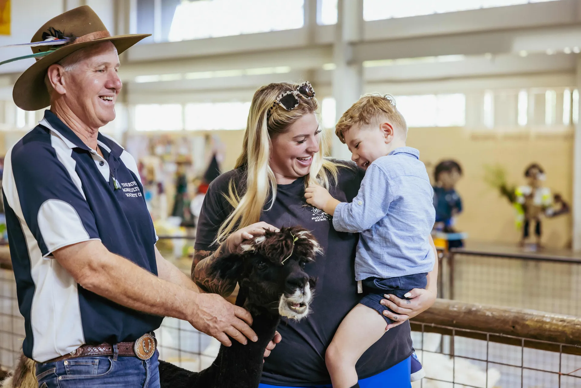 Family enjoying animal nursery at the Perth Royal Show