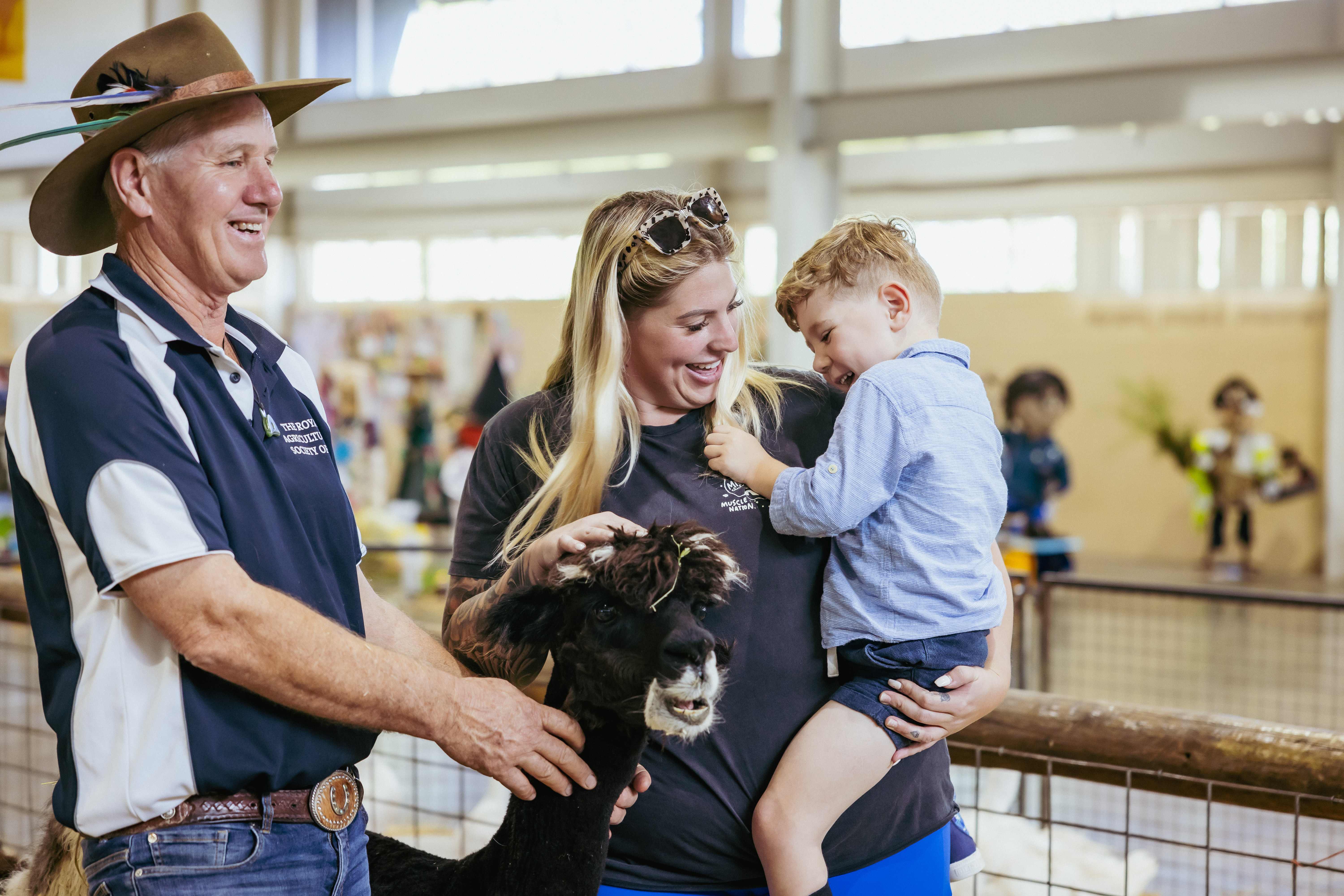 Family enjoying animal nursery at the Perth Royal Show