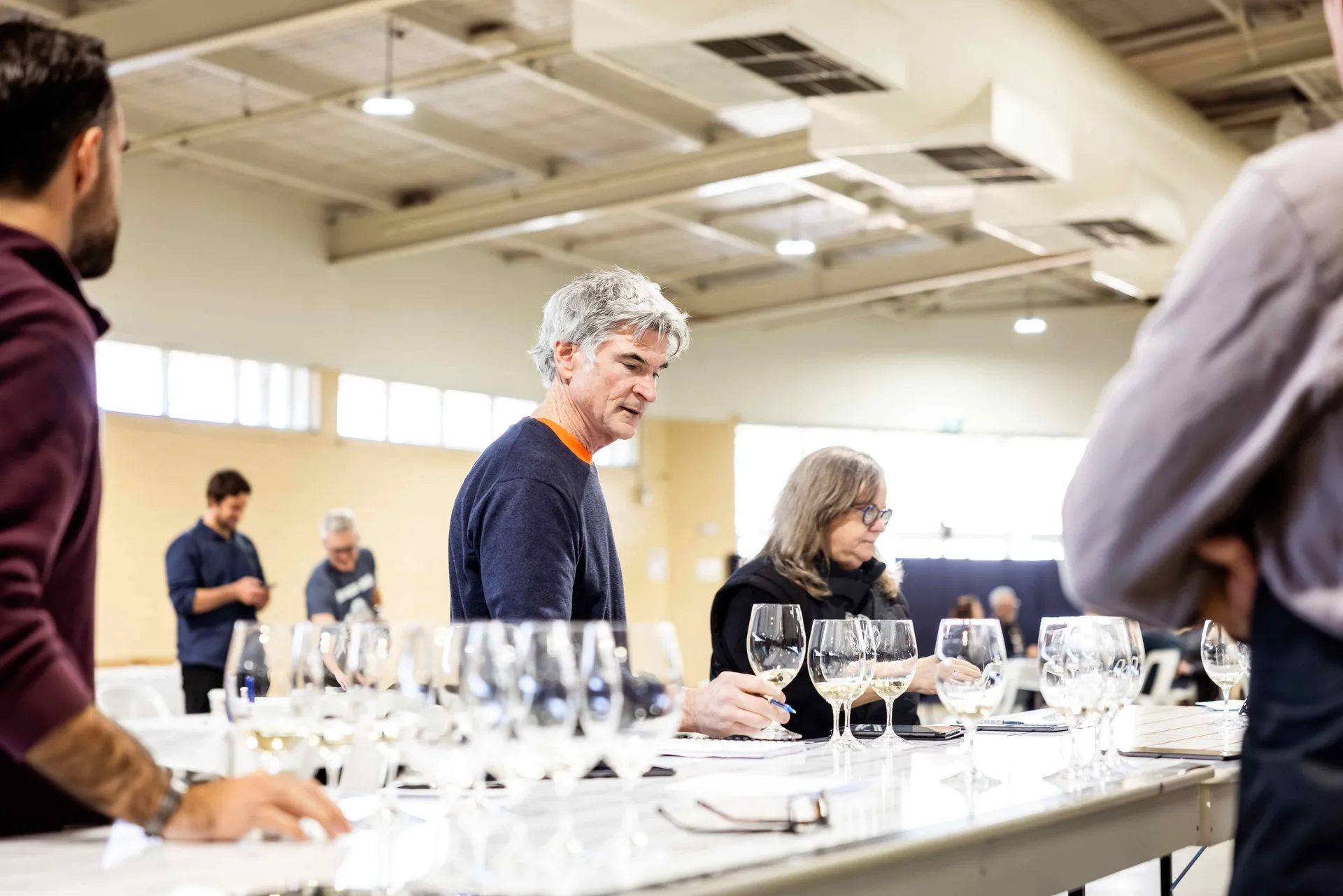 Judges reviewing wine samples at the Perth Royal Food Awards.